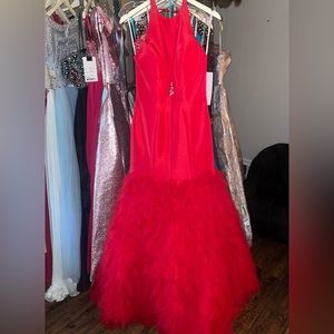 MacDuggal red mermaid gown with tulle bottom.